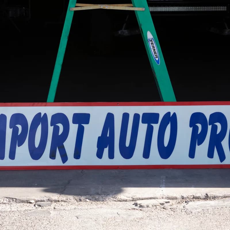 Illuminated Import Auto Pros sign
