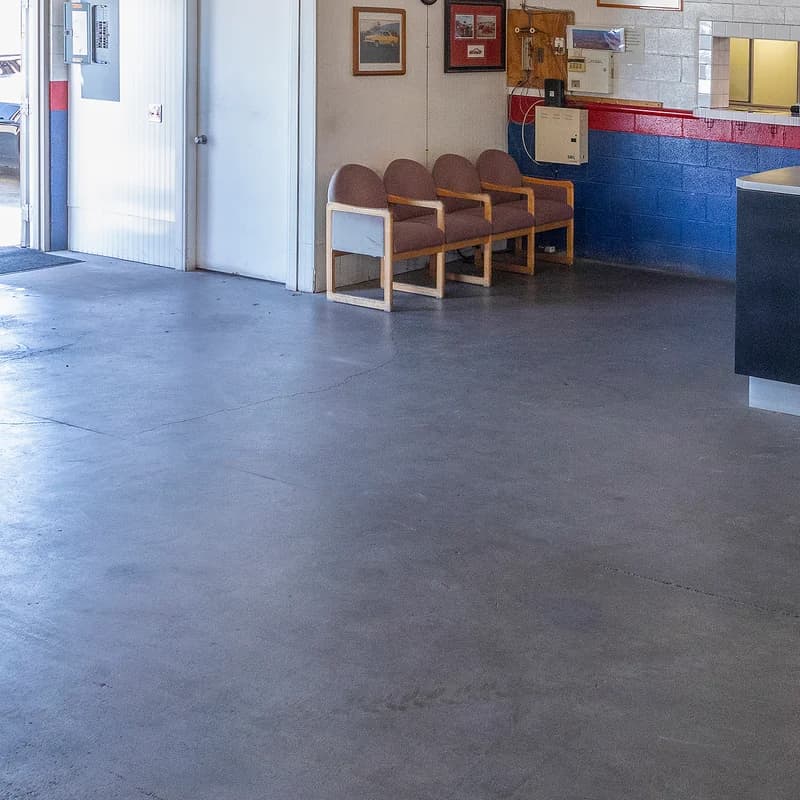 Waiting chairs beside the service counter